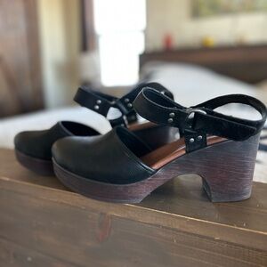 Elegant Black Leather Mules with Strap